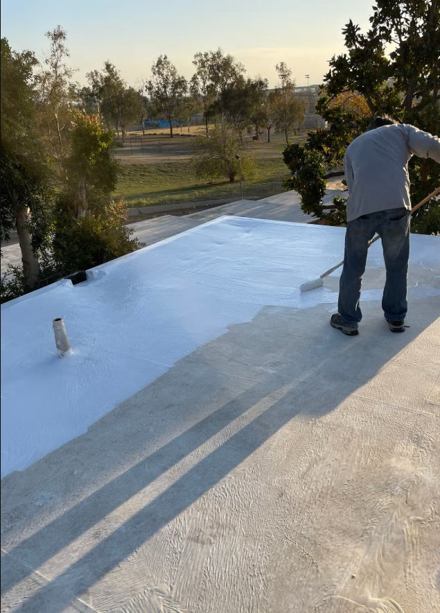 image of Flat roof silicon coating being done